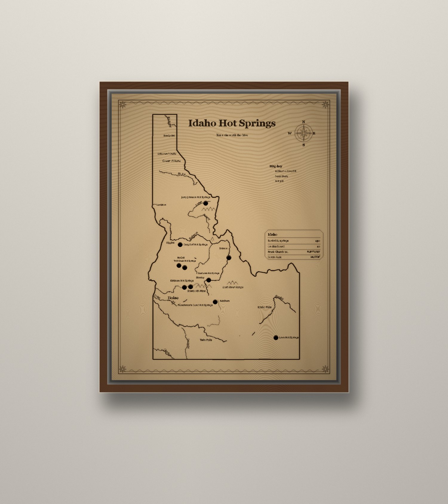 Idaho hot springs map framed on a wall